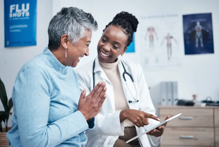 A doctor meeting with a patient