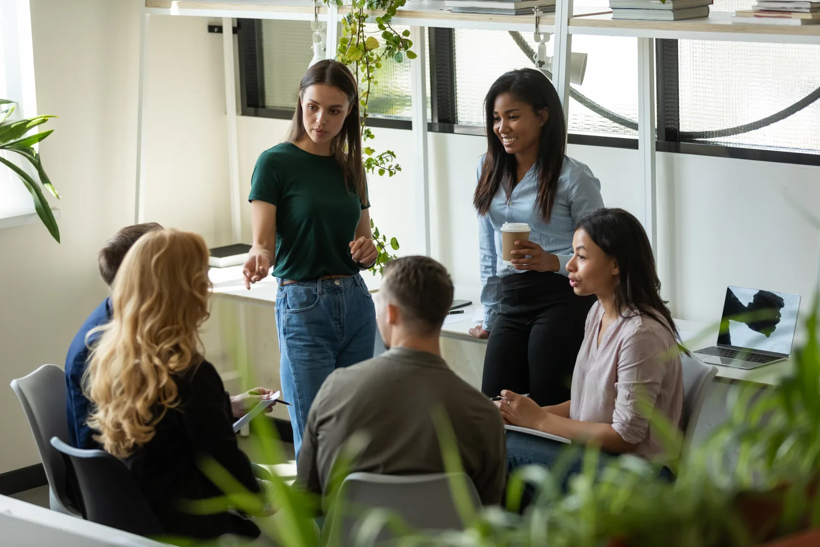 A group of Acadia employees conducting a meeting