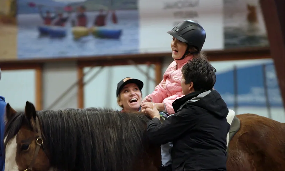 Rett syndrome patient Lucy riding a horse